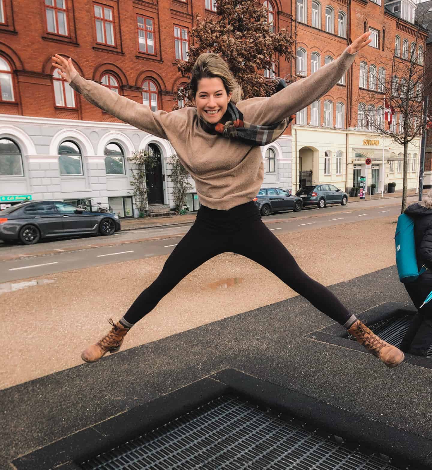 Girl Jumping on a street trampoline in copenhagen