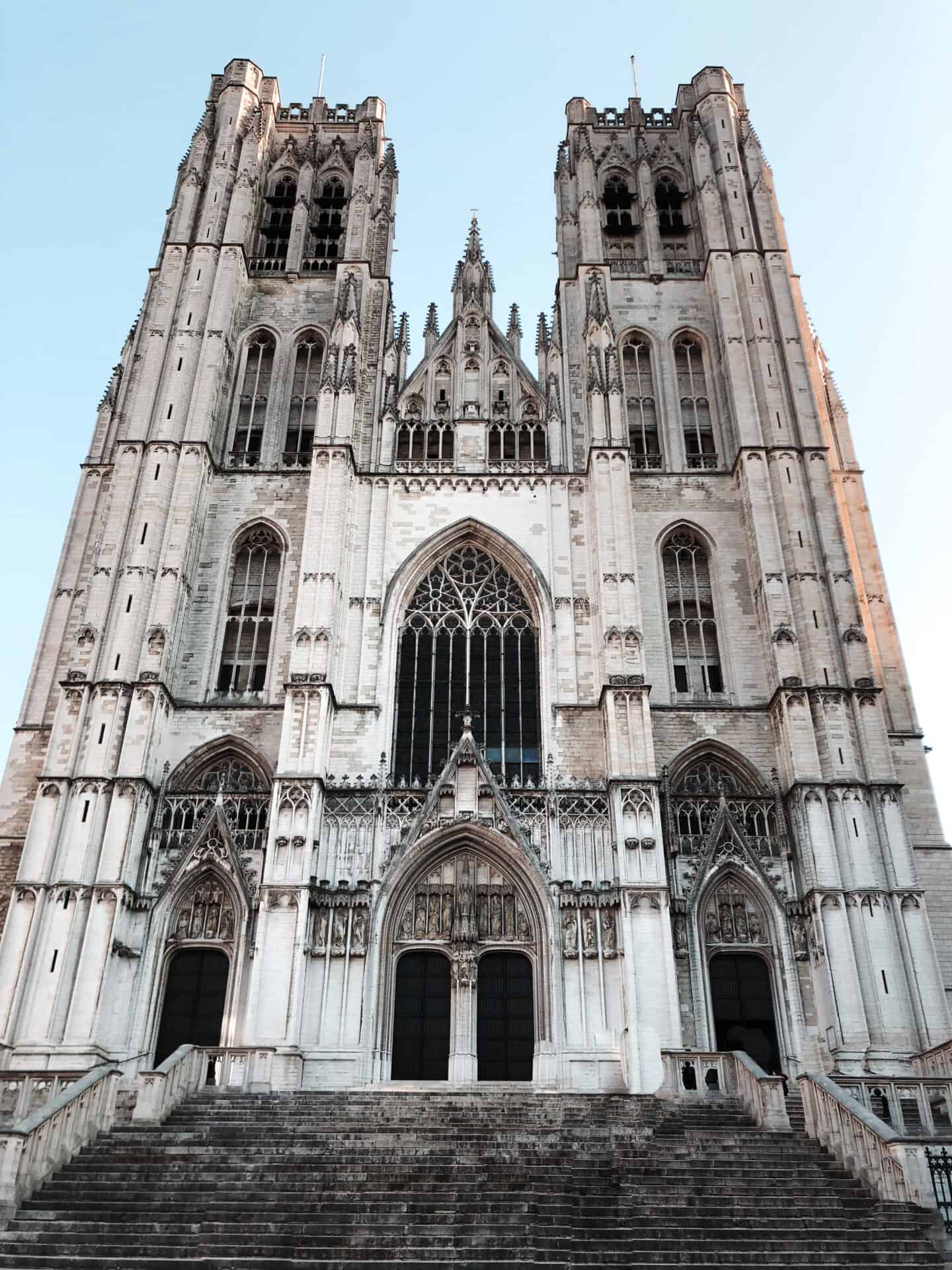 Exterior of white stone Cathedral in Brussels during day