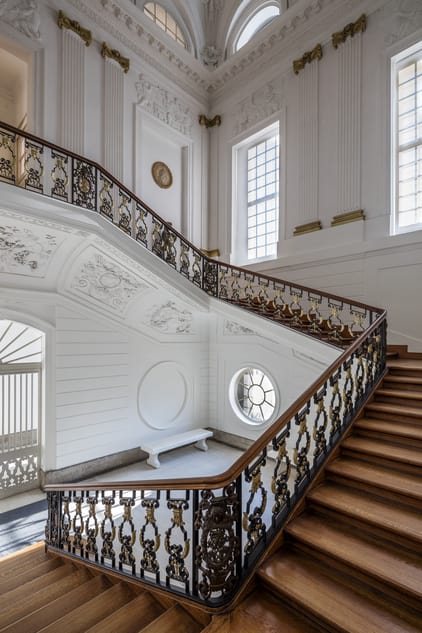 regal white wooden stairway