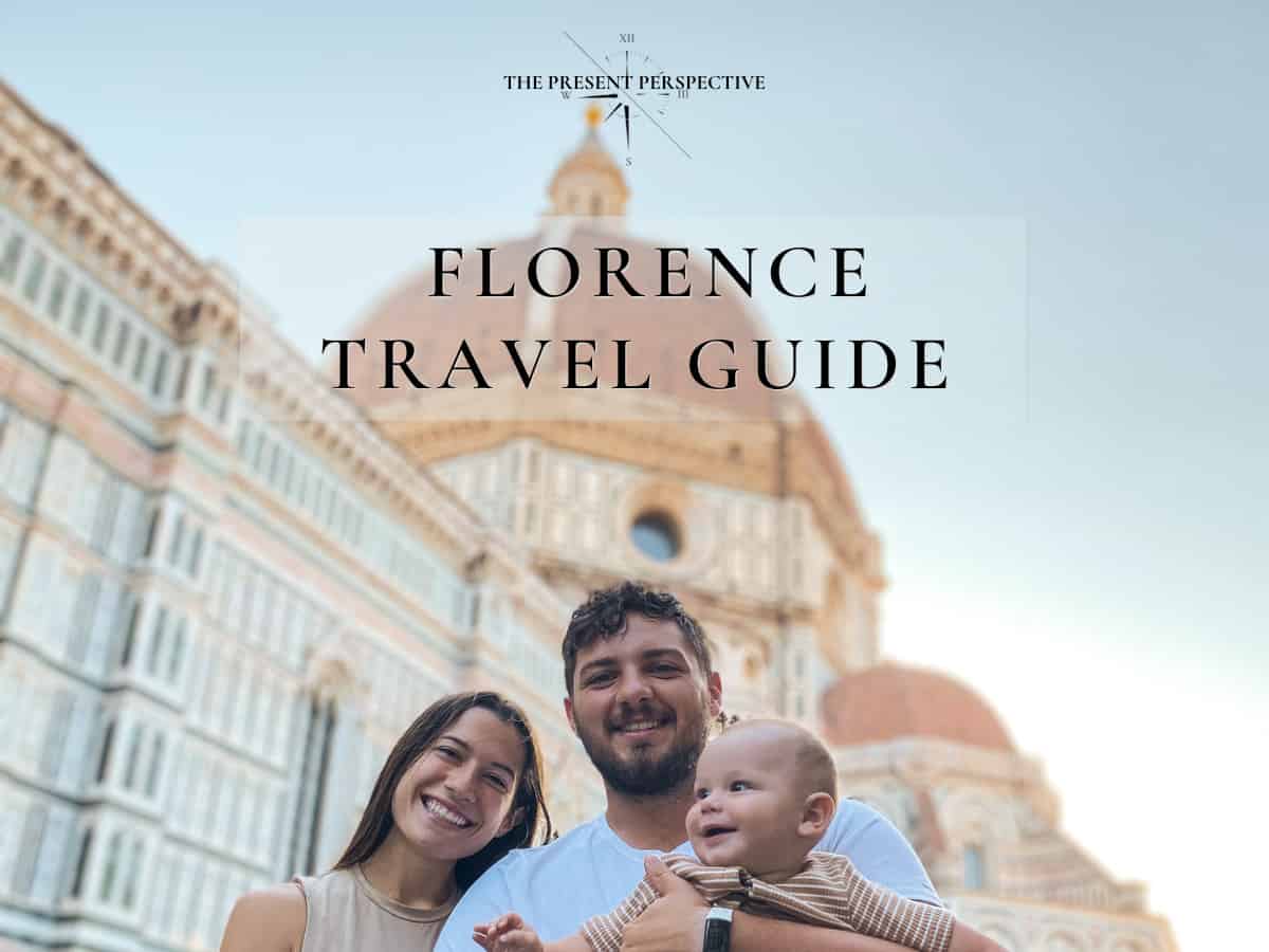 Sweet Couple with baby in arms smiling in front of Florence's Dome