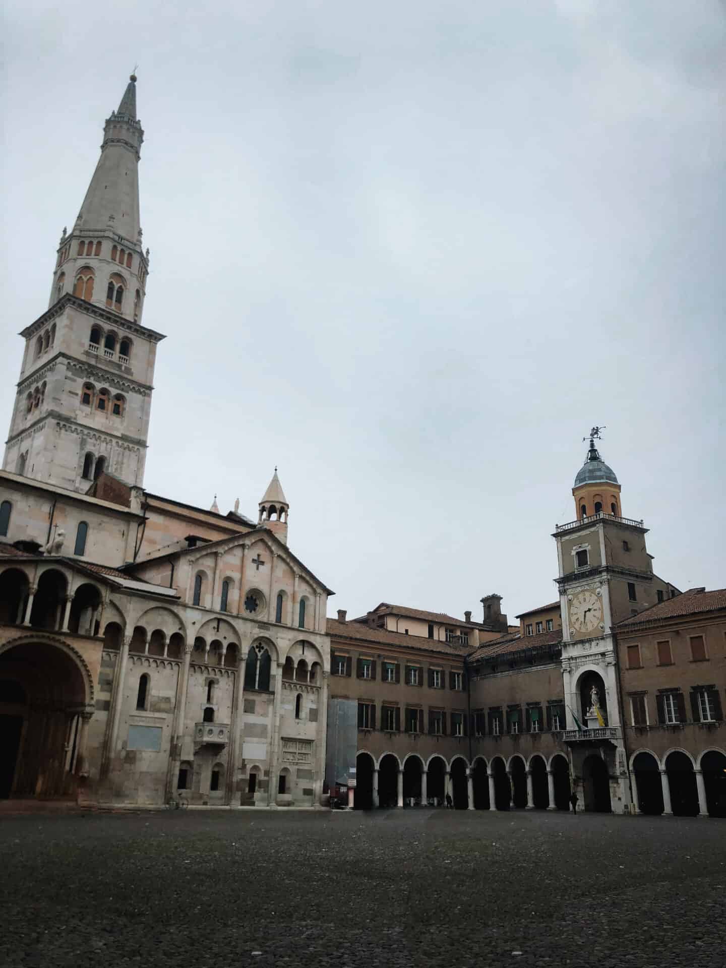 Dark Moody town square in Modena Italy