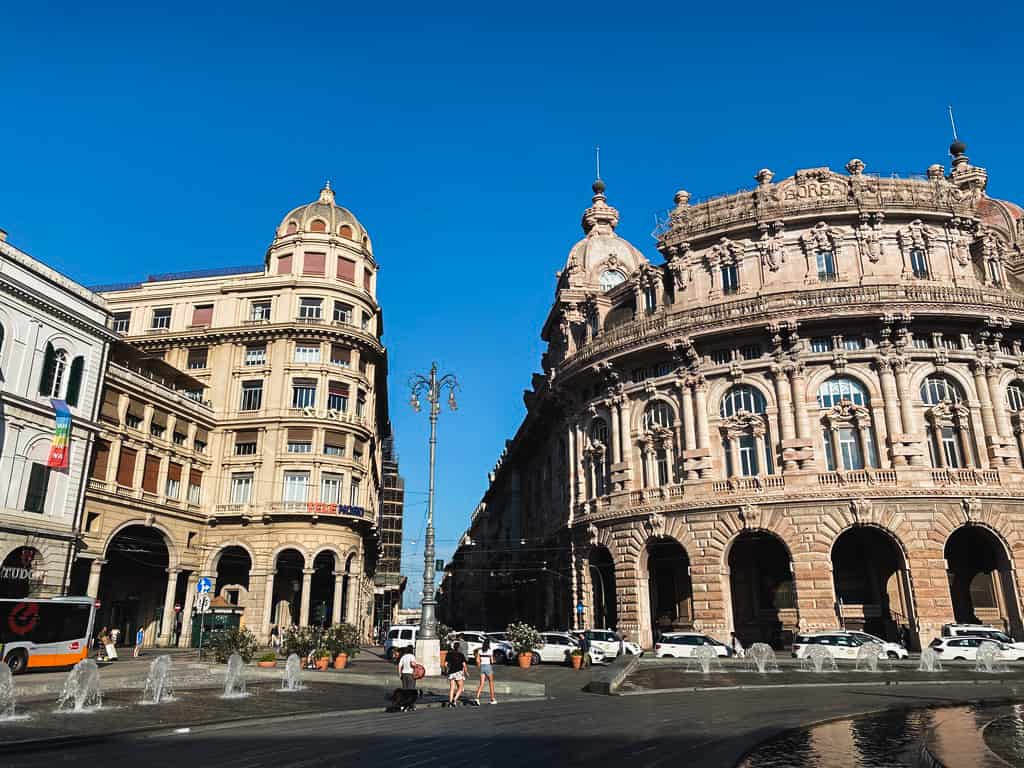 Taxis lined up in the Piazza De Ferrari in Genoa Italy