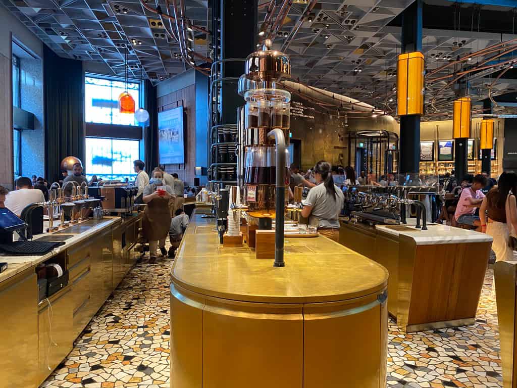 Barista making iced coffee in Starbucks Reserve Roastery in Milan