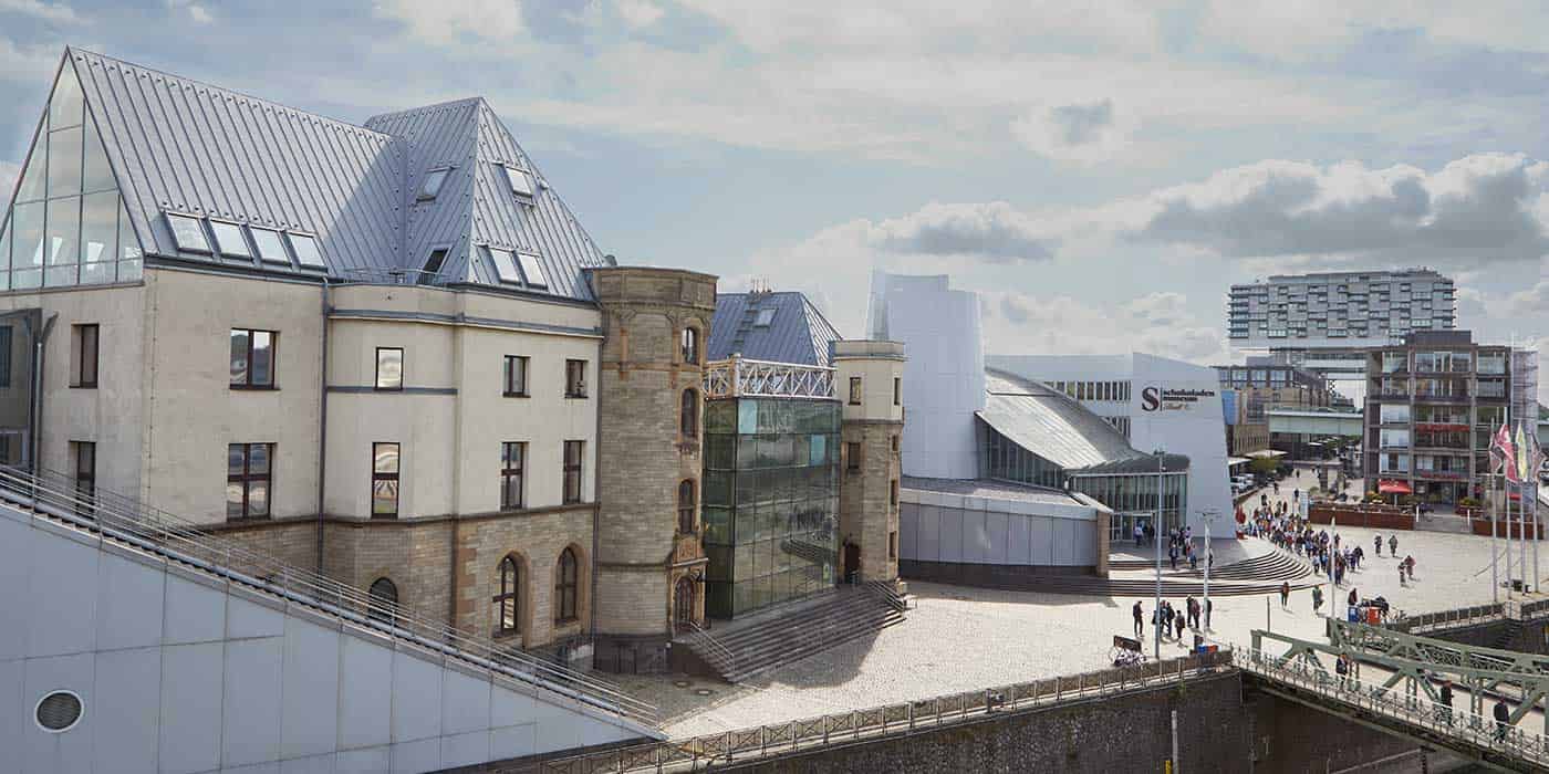 exterior of a castle chocolate museum on bright day