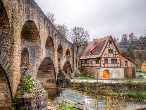 charming european cottage by a river and aquaducts