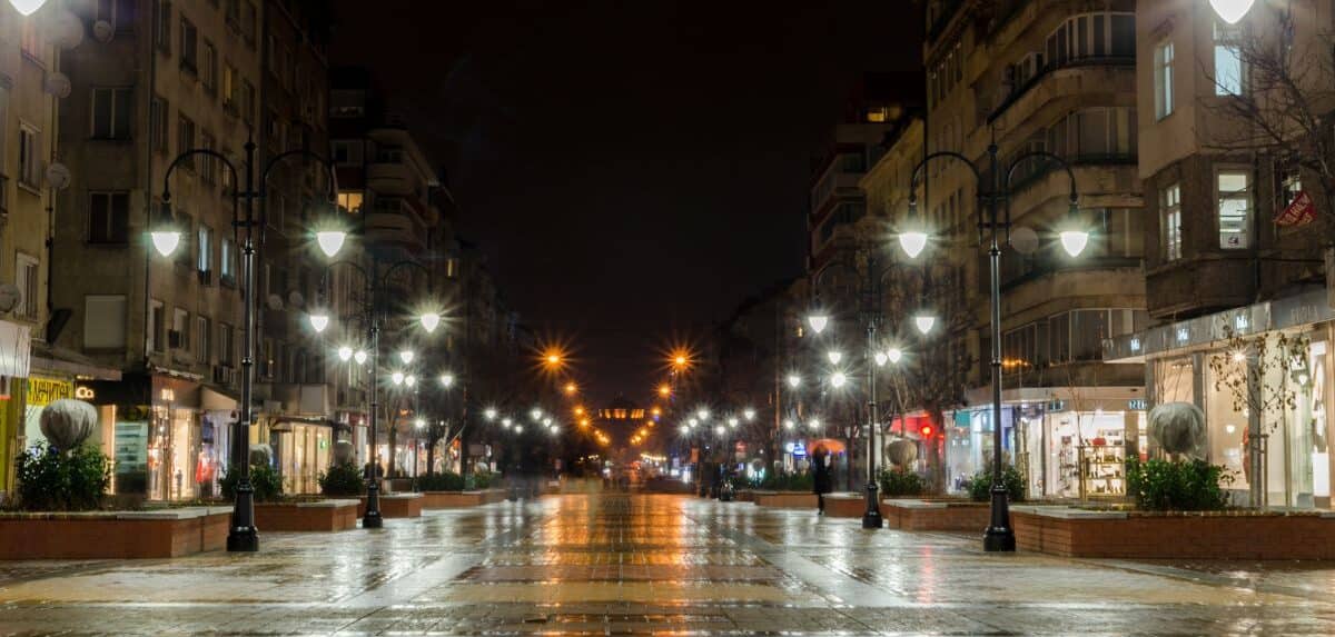 pedestrian street in a city at night