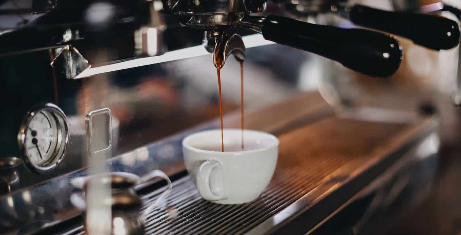 Fresh single espresso shot being brewed at a coffee shop in Italy