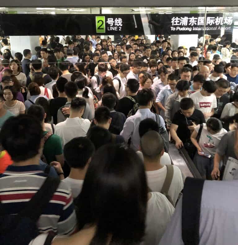crowded metro station in shanghai during rush hour