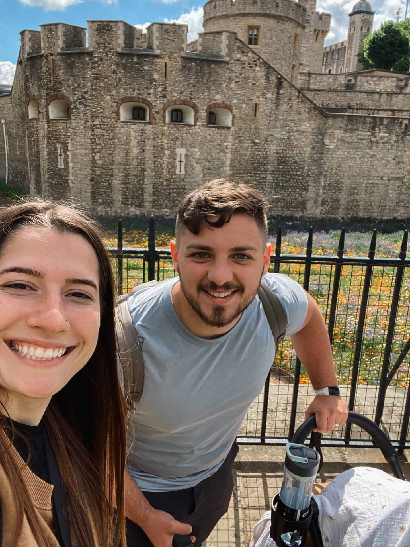Couple taking a selfie in front of Tower of London
