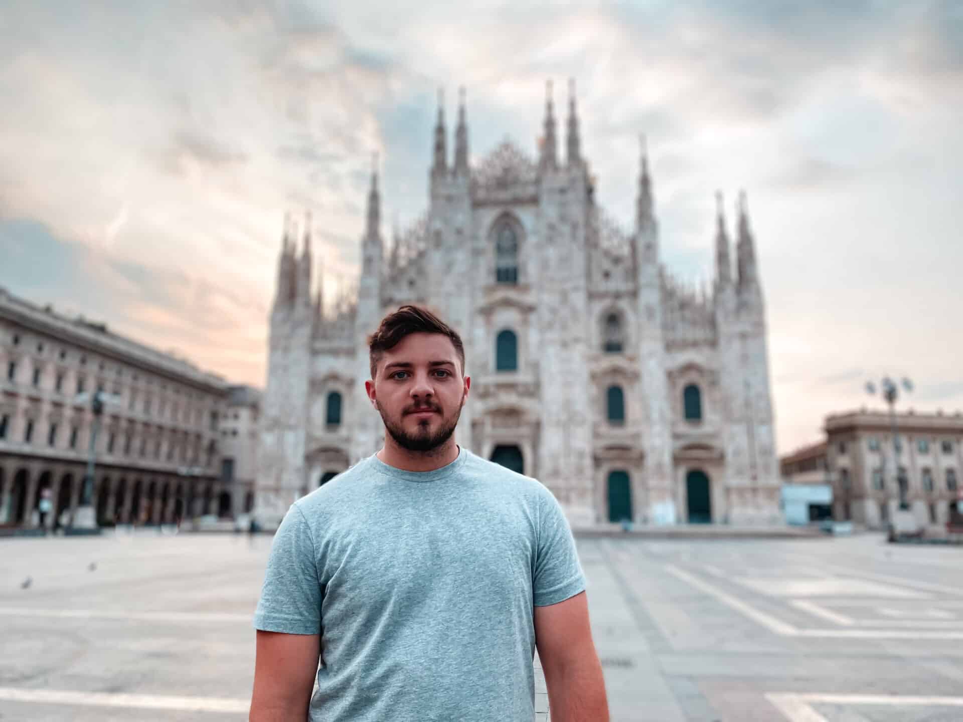 male model in light blue shirt at Milan Duomo