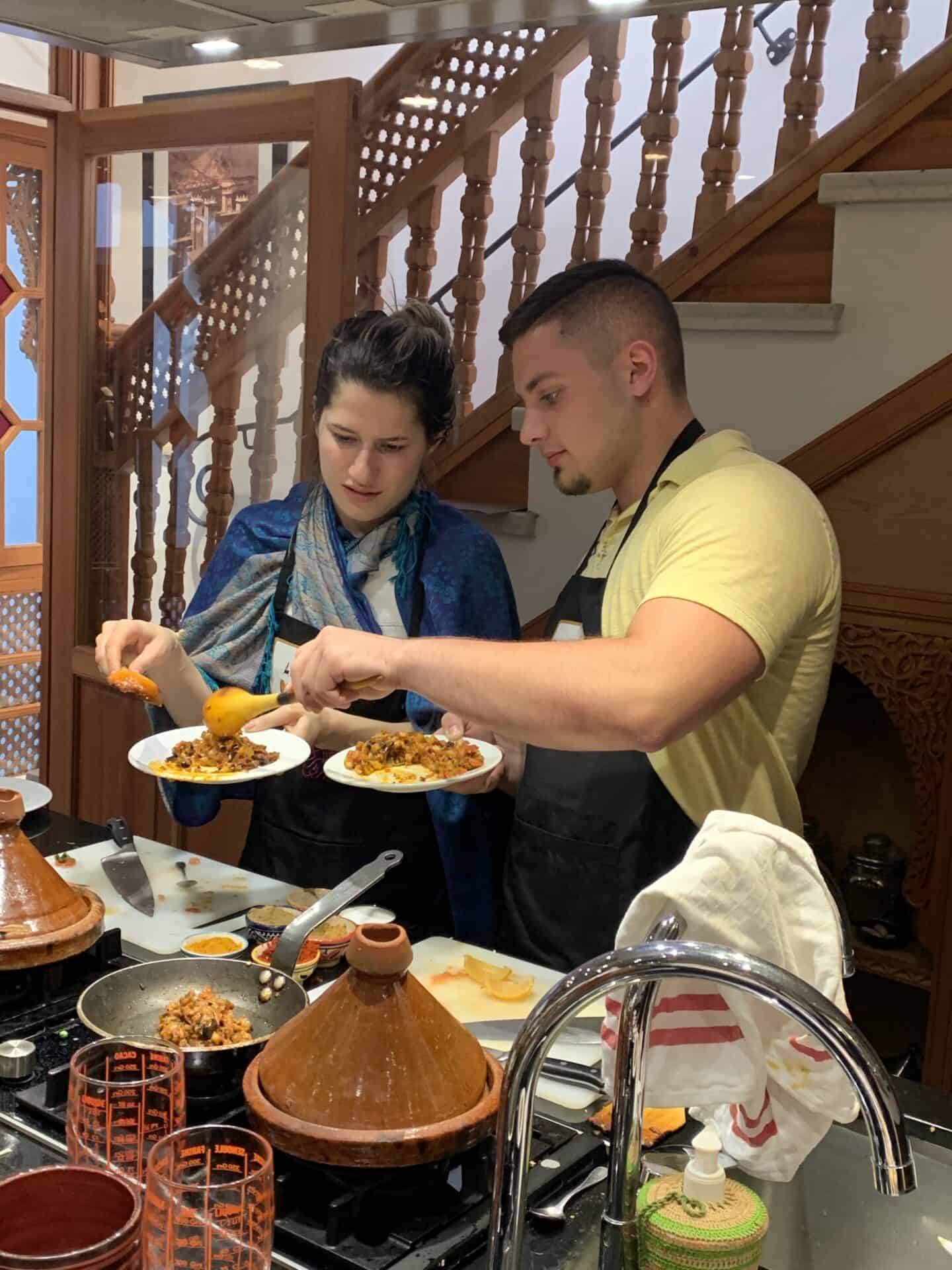 husband and wife in a moroccan cooking class