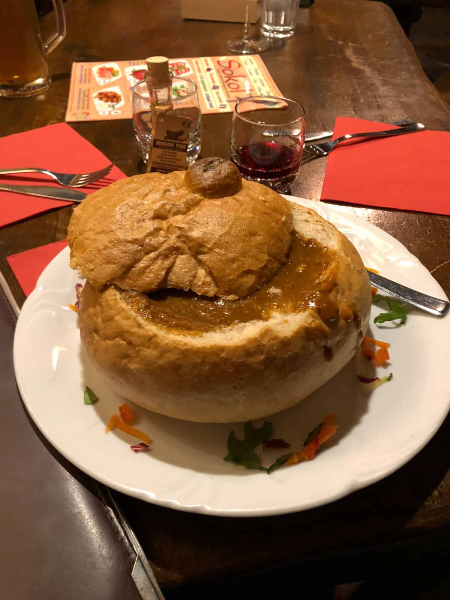 venison gulash served in a bread bowl