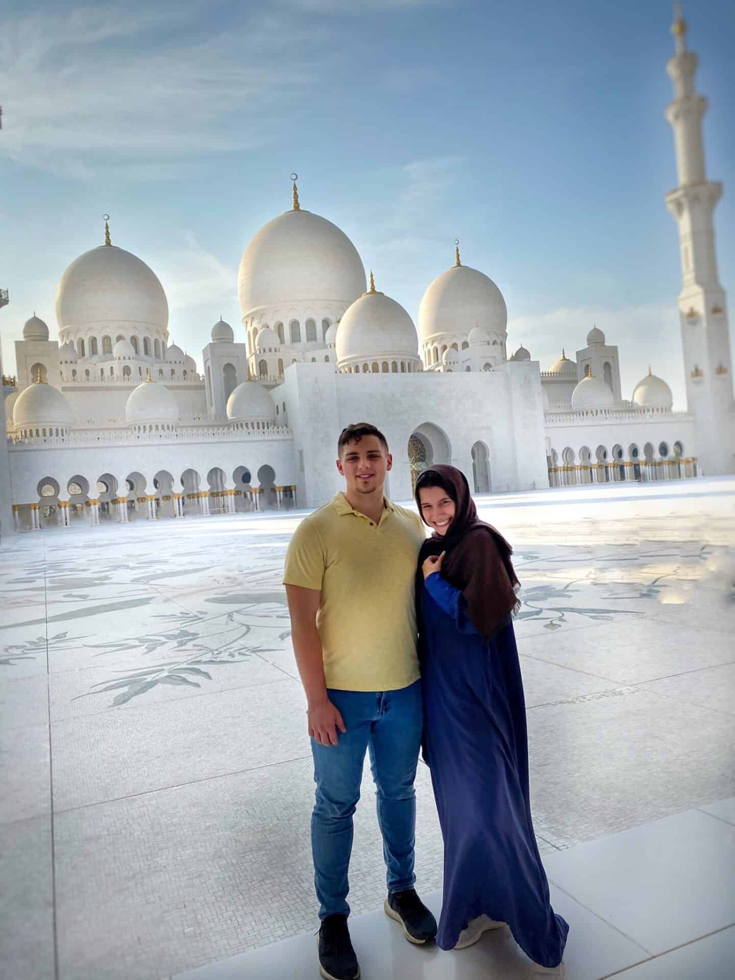 man and woman in hijab at the Sheikh Zayed Grande Mosque in Abu Dhabi