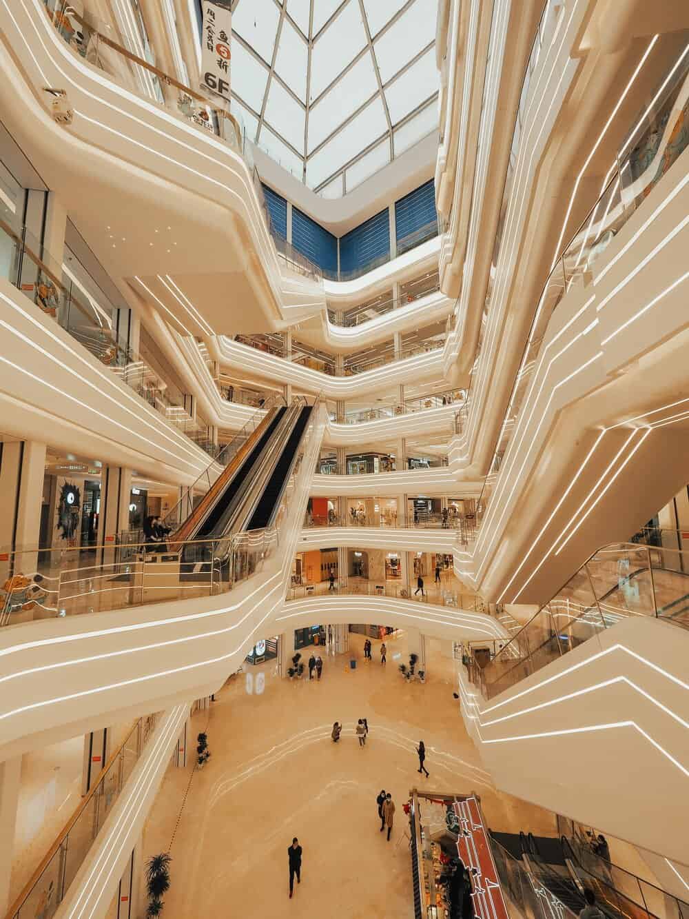 Crowds walking up an escalator in the Yas Mall in Abu Dhabi