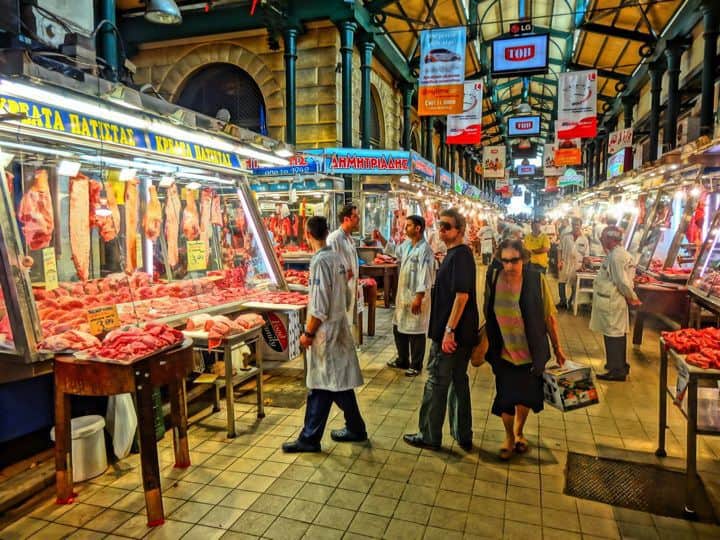 crowds walking through market in Athens