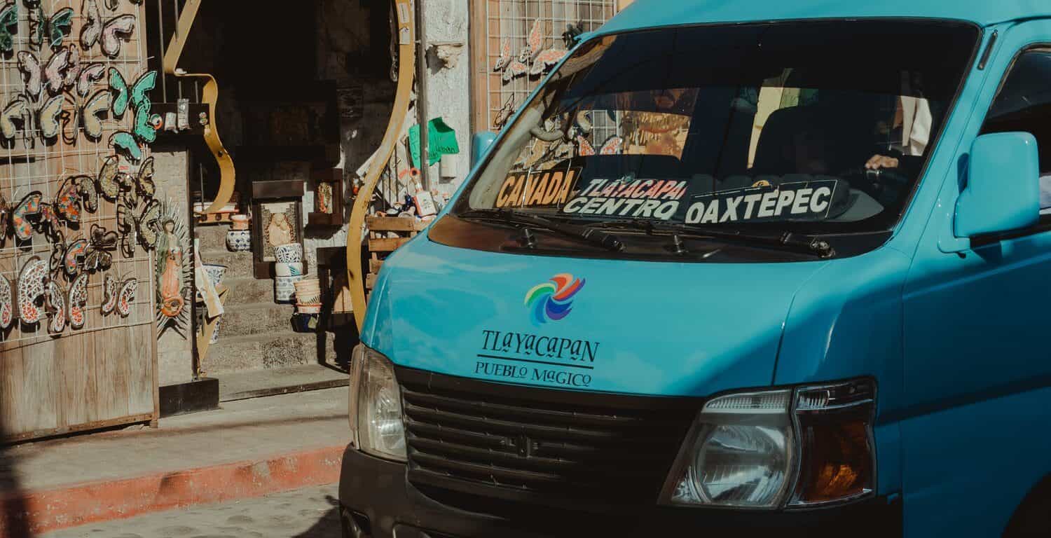 Colectivo driving through the streets of a Pueblo Magico in Mexico