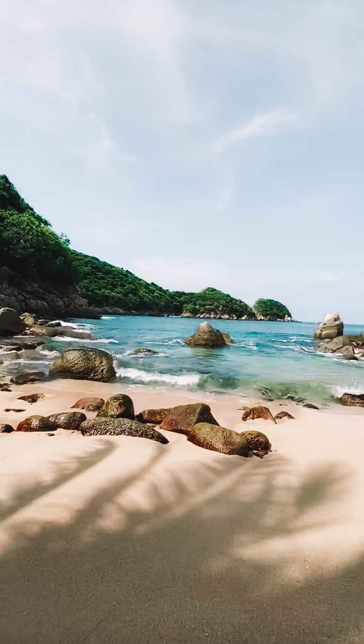 tranquil beach with clean sand and blue waters