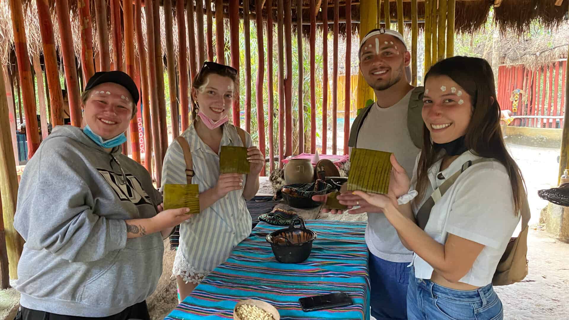 group of tourists making tamales in cozumel