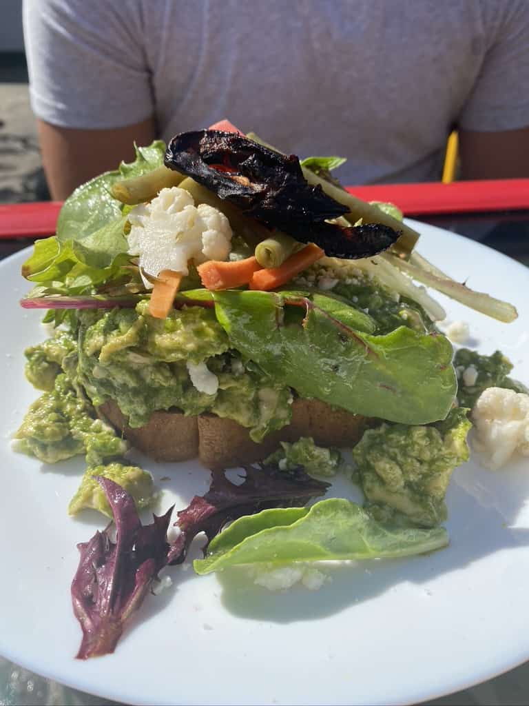 green avocado toast with salad