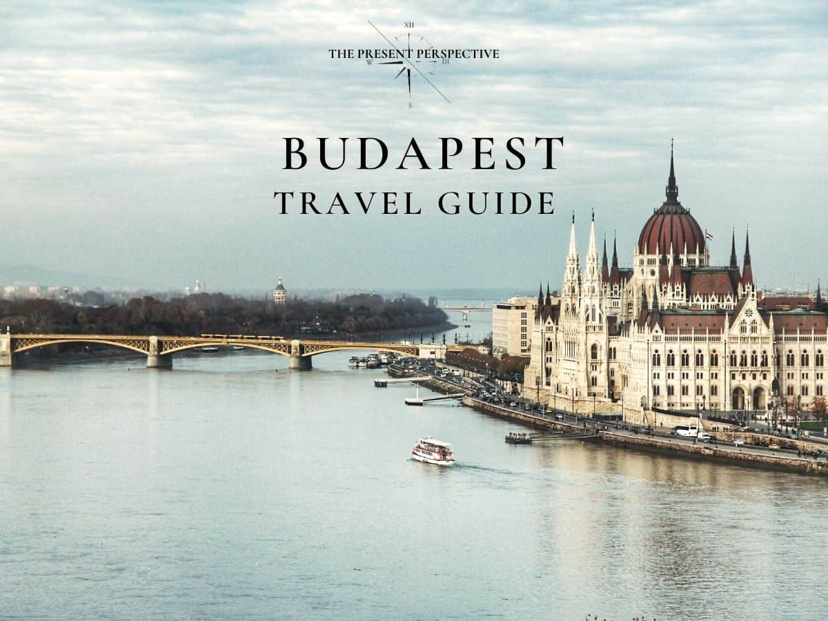 tips to travel to budapest drone shot view of budapest parliament building and river