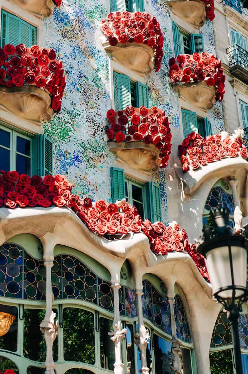 Colorful red roses at Casa Batllo in Barcelona during summer