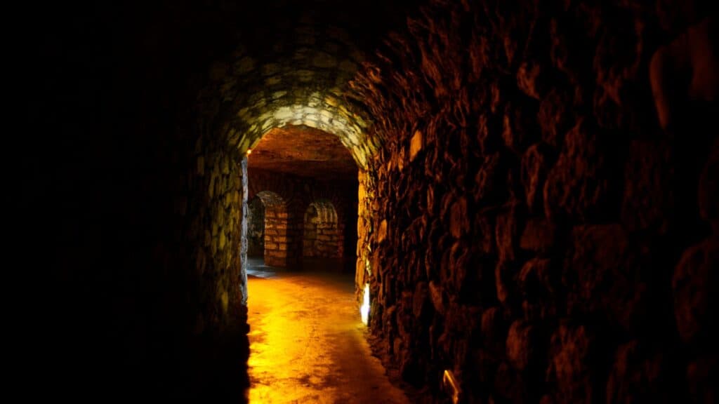 dark underground brick tunnel