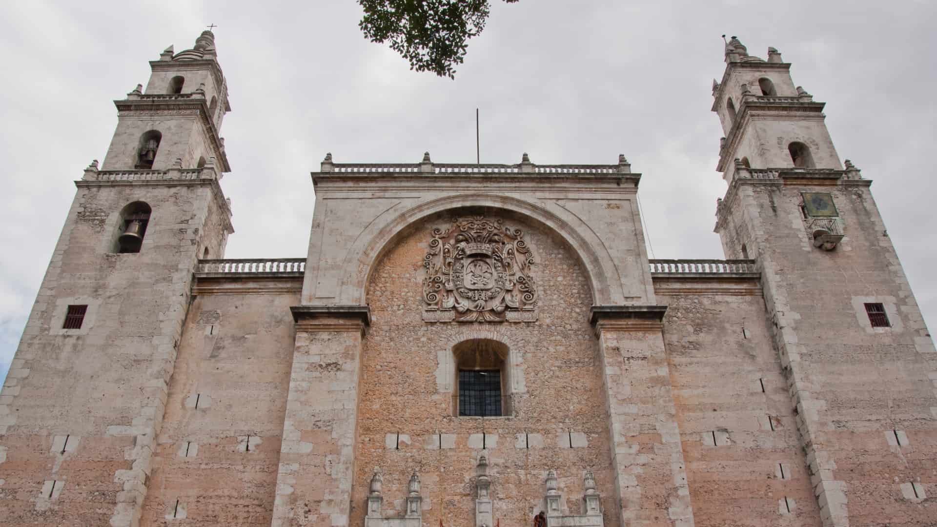 exterior of sand colored catholic cathedral in mexico