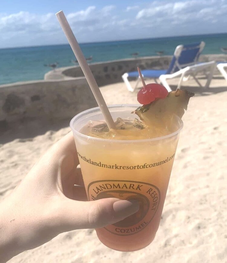 alcoholic drink on beach in cozumel