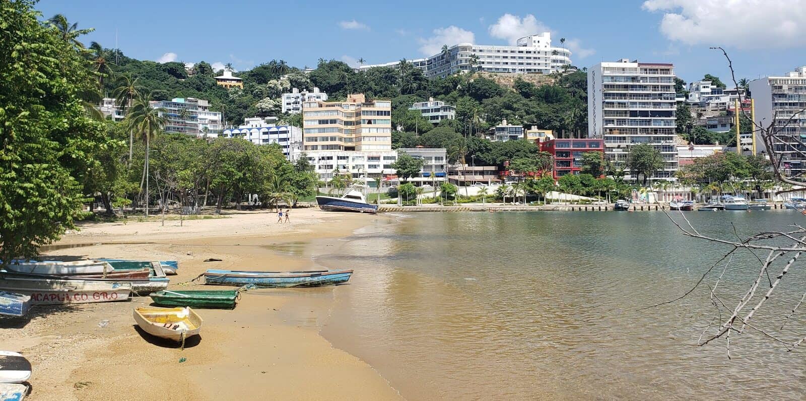 beach with small boats in mexico