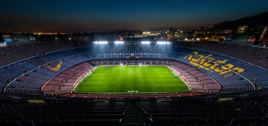 Camp Nou Soccer Stadium at night in Barcelona