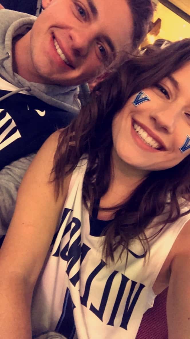 selfie of two villanova students at college basketball game