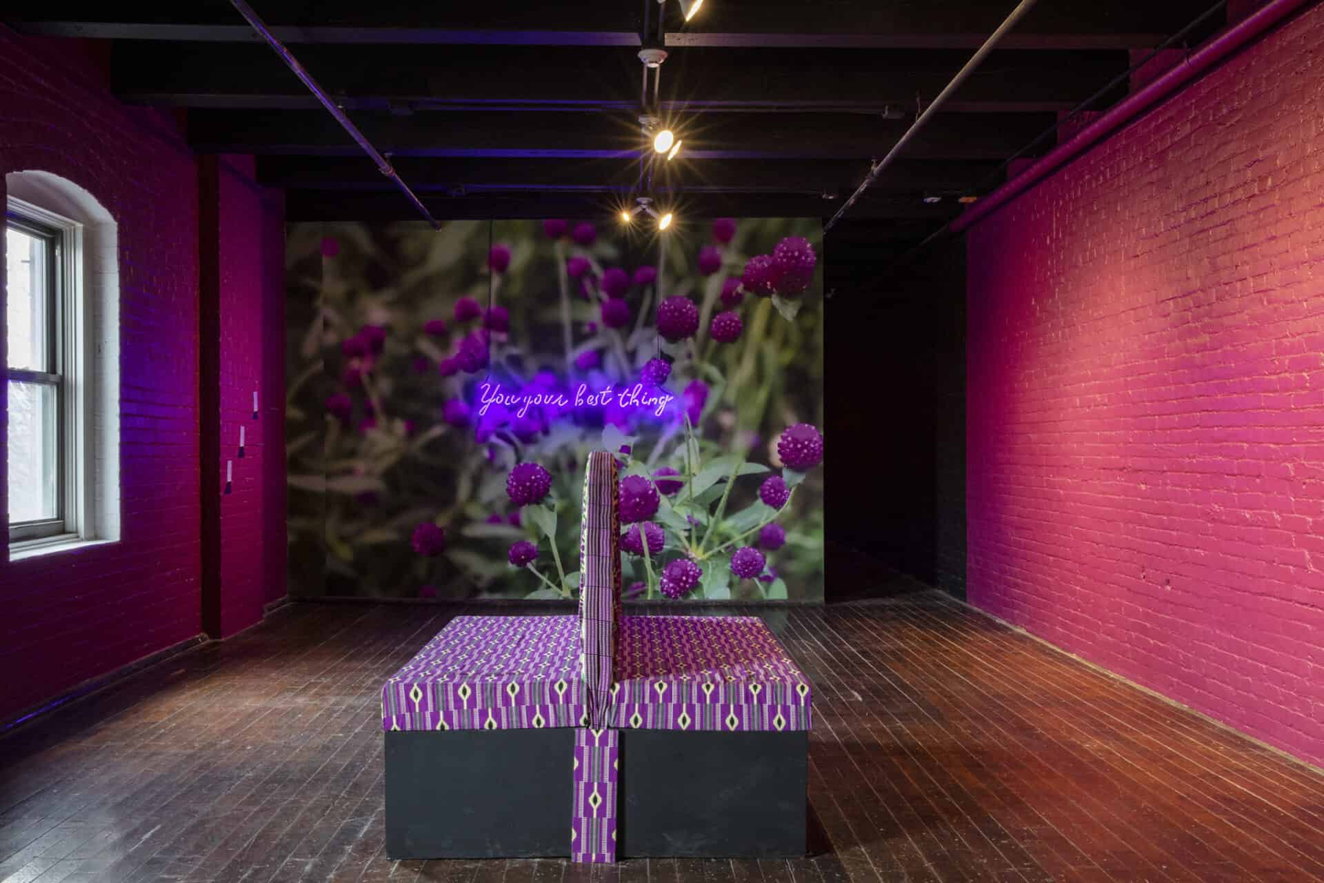 a purple bench in the middle of a museum room