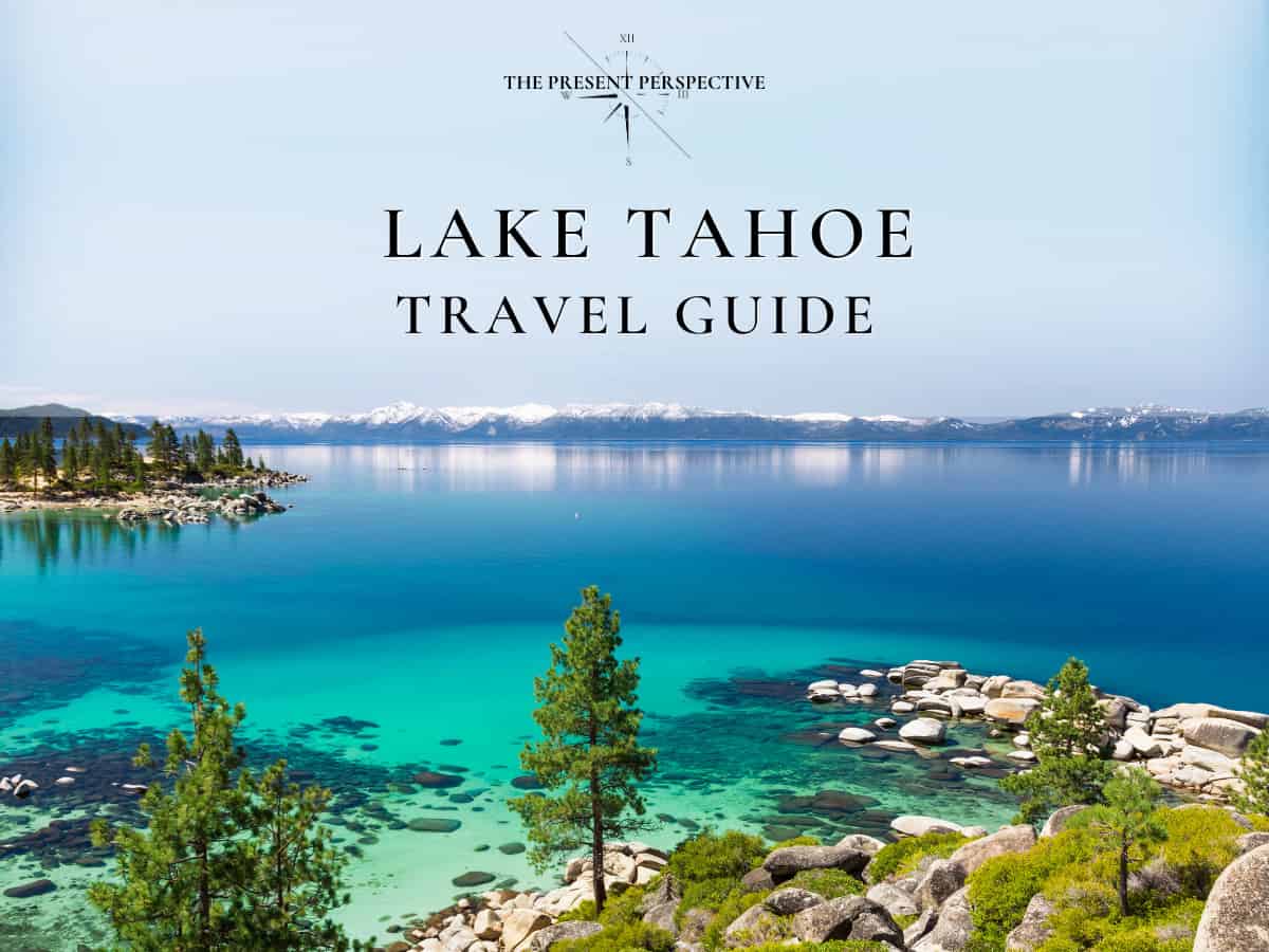 gorgeous green and blue crystal clear lake tahoe with snow capped mountains and green pine trees