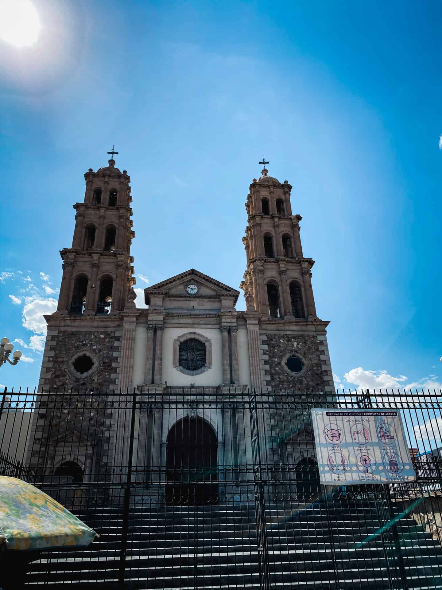 Cathedral in Juarez Mexico under blue sky
