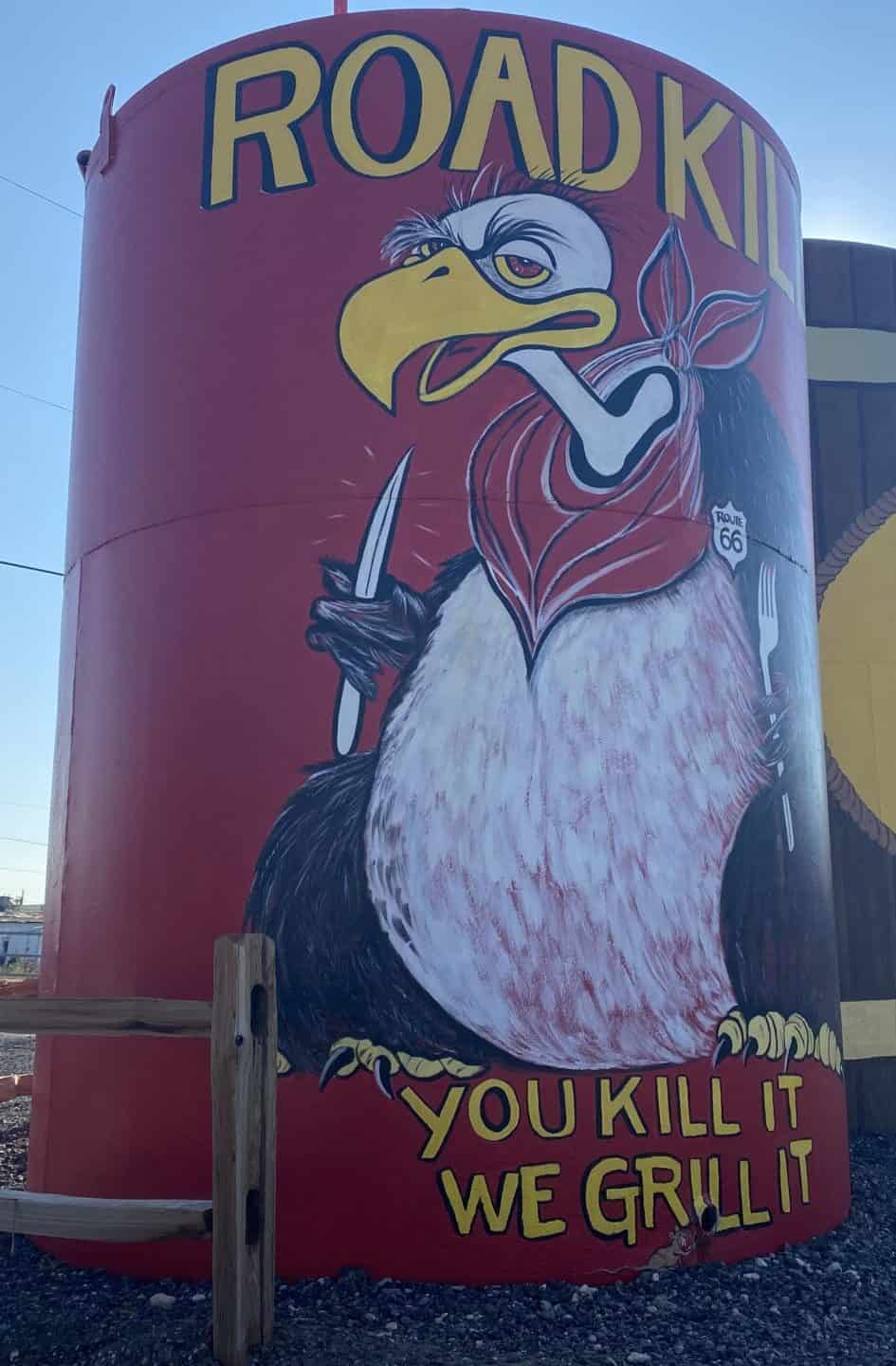 Mural of buzzard with a bib advertised for Roadkill cafe on Route 66