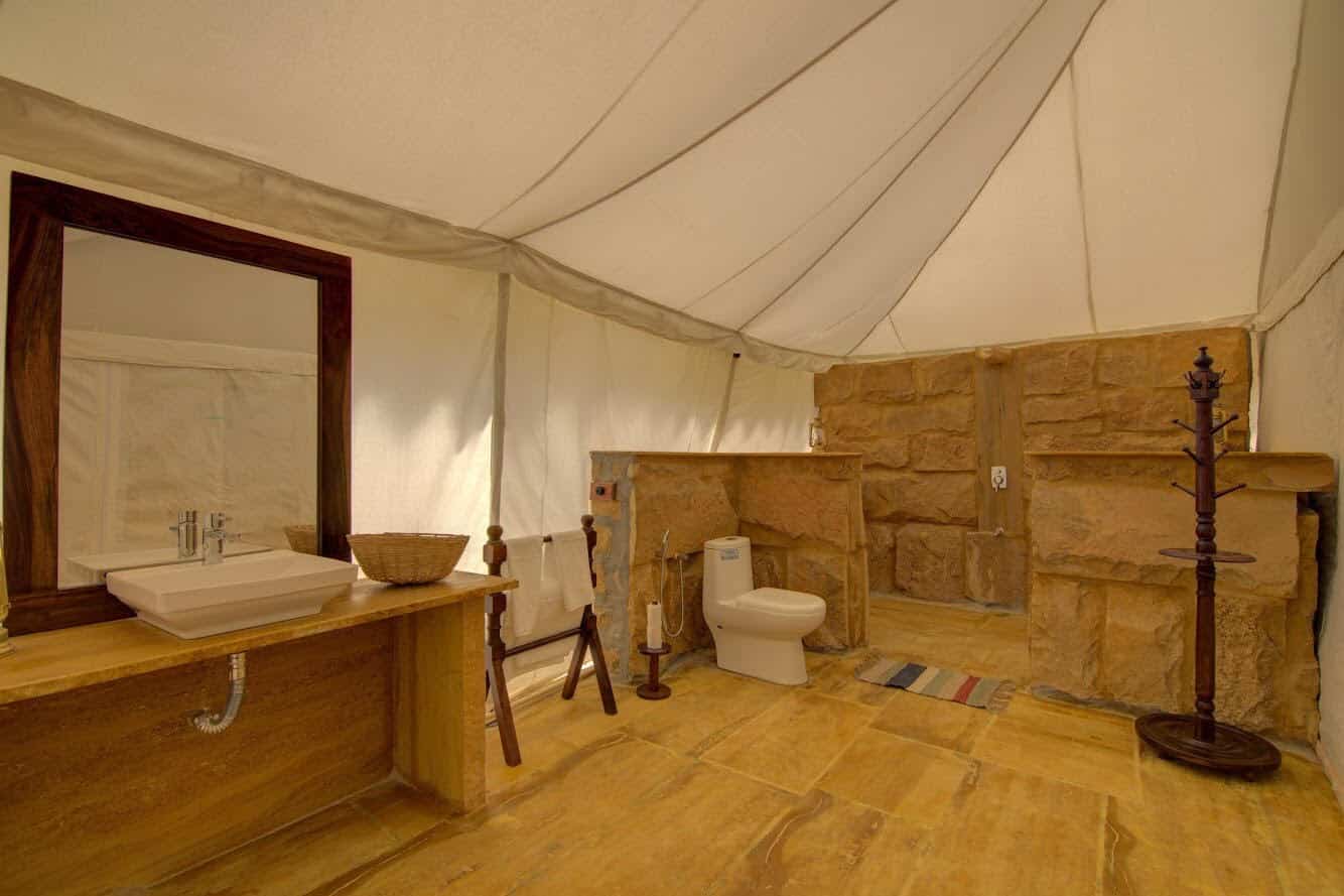 a large modern minimal stone bathroom