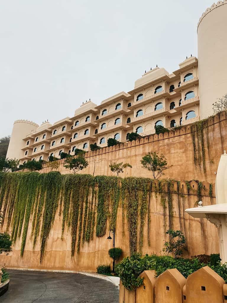 green vines crawling down the majestic walls of a castle hotel