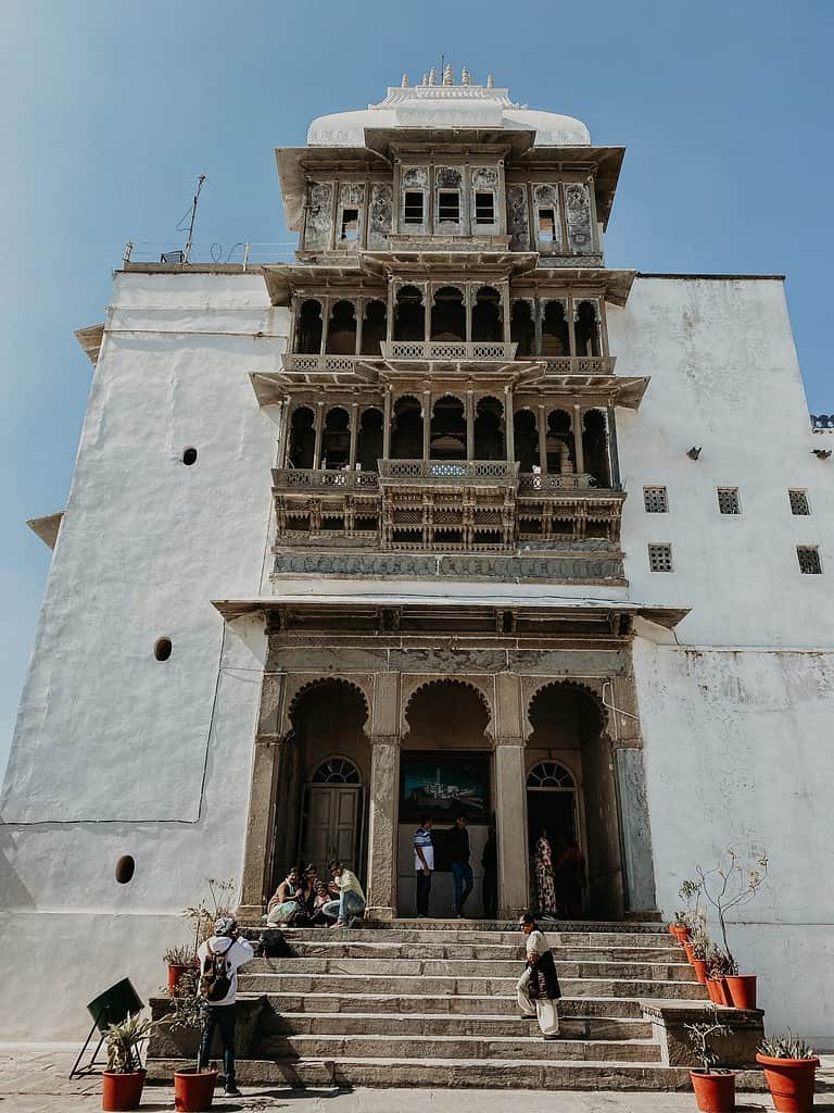 gorgeous white exterior of monsoon palace in Udaipur