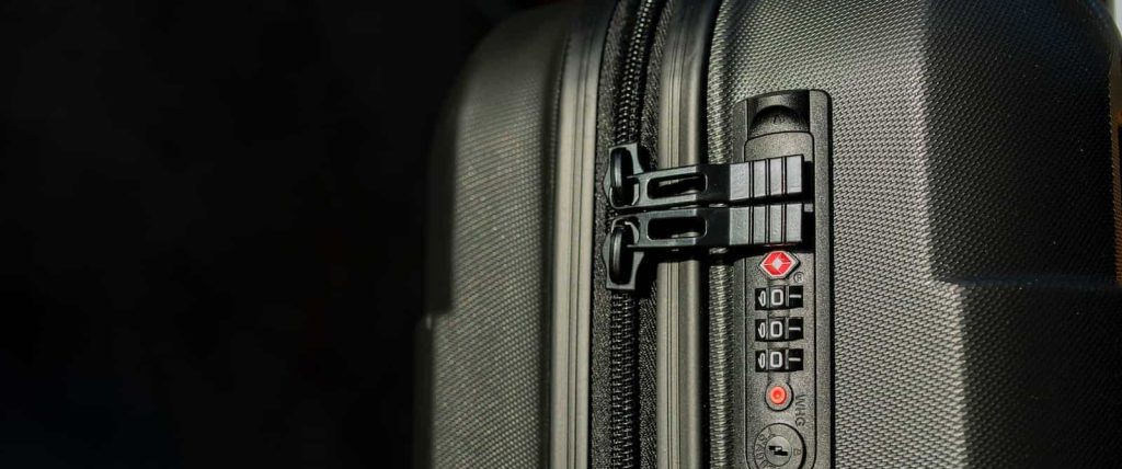a close up of a black piece of luggage with locks