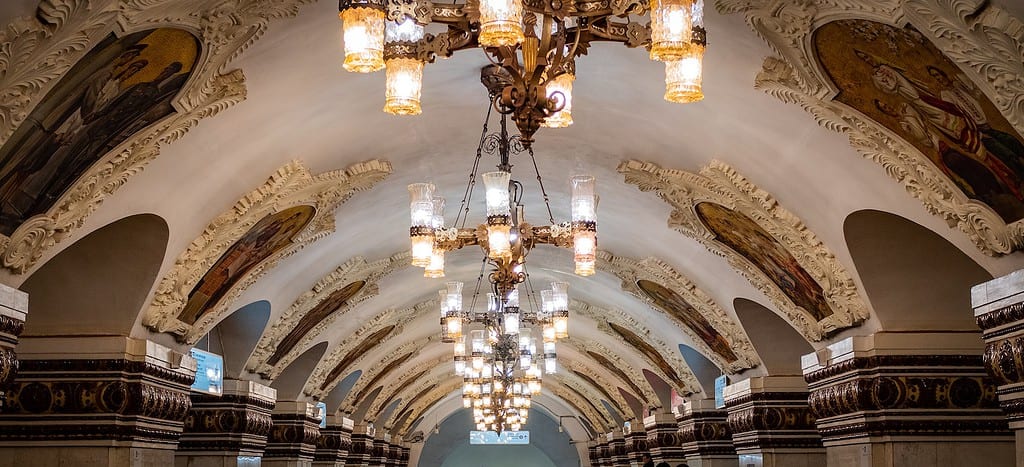 turned-on chandelier on ceiling of moscow metro