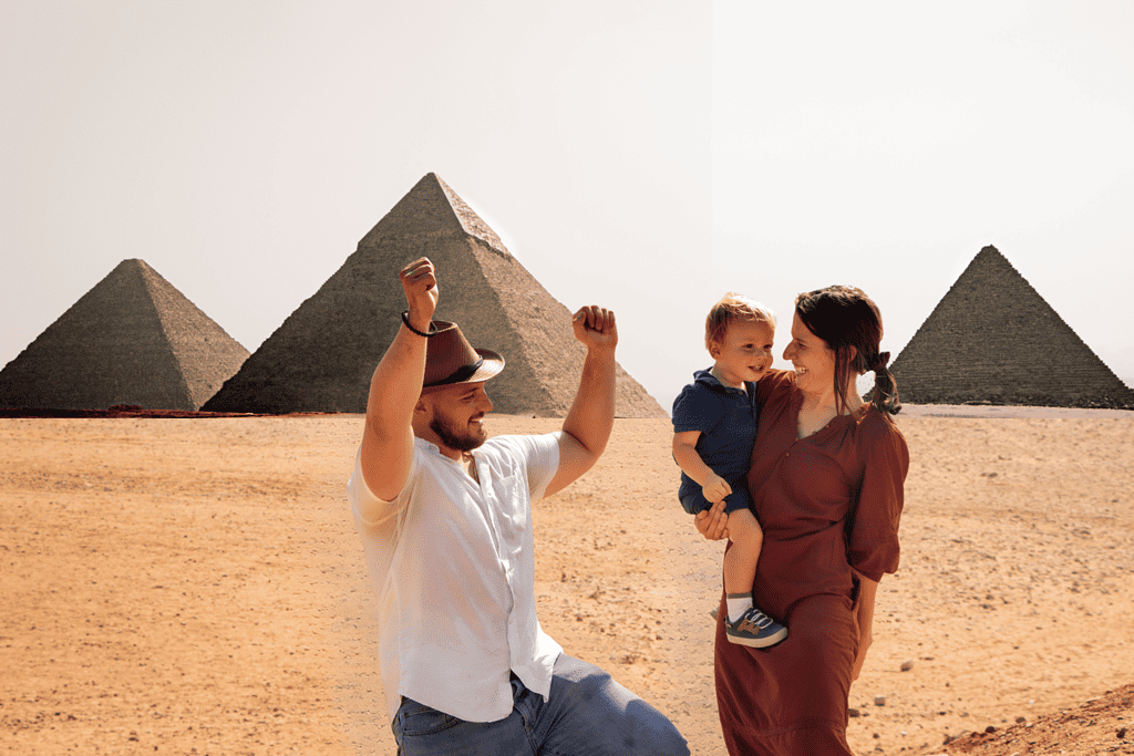 family of travel journalists dancing in the desert in front of the great pyramids of giza