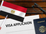 Egyptian flag and visa application with passport